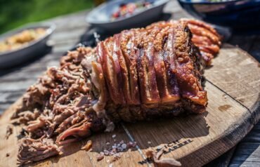 grilled meat on brown chopping board