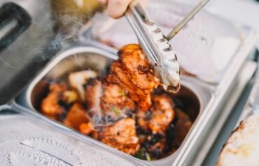 person holding stainless steel fork